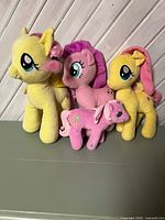 Front view of four My Little Pony plush toys