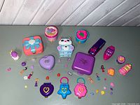 All compacts, vehicle, watch and figures arranged closed