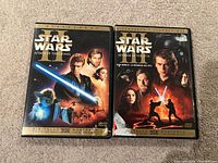Front view of both Star Wars DVDs in their cases