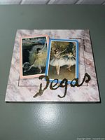 closed Degas presentation case with sample card images