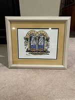 Front view of framed watercolour showing artwork, mat and frame
