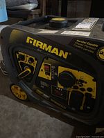 Front and side view of Firman generator showing control panel, brand name, wheels and handle