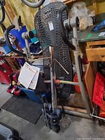 Full view of inversion table showing frame, backrest and attached manual