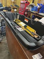 Black Pelican Trek 45 sled with included bungee and rope visible