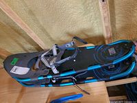 Tubbs snowshoe showing top deck, frame, and binding