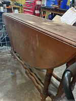 side view of drop-leaf table folded down