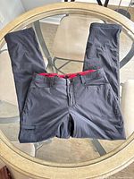 Pants folded at waist showing overall color and style