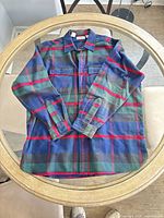 Front view of full shirt laid flat on table showing overall color and pattern