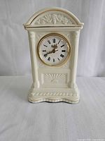 Front view of Belleek porcelain mantel clock