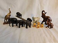Group shot of all elephant pieces showing materials and sizes