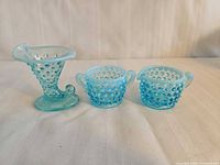 Front view of all three turquoise opalescent hobnail pieces