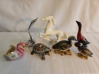 Group shot of all seven figurines