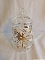 Jar with lid in full view showing starburst pattern