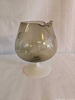 Front view of smokey glass mixing pitcher showing etched wheat pattern and opaline stem