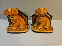 Front view of both plasterware puppy bookends