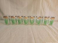 Full set of eight matching glasses in a row