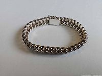 Full view of closed 835 silver chain bracelet