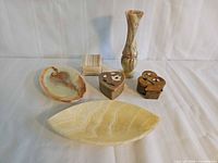Group shot of all six stone decor items