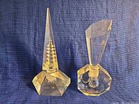 Front view of both crystal perfume bottles standing upright