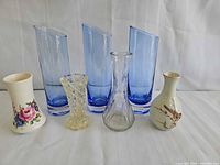 All seven vases front view
