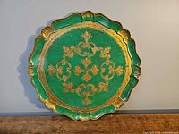 Front of green and gold Florentine tray