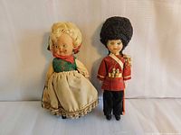 Front view of both dolls standing