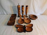 All 13 wooden decor items laid out