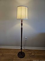 Full view of floor lamp with shade