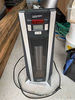Full view of tower heater showing overall design and power cord