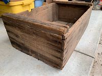 Perspective view showing overall crate, slat construction, and corner joints