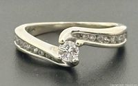 Full view of bypass diamond ring front