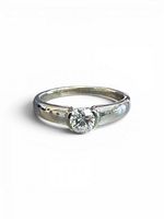 Front view of ring showing diamond and setting