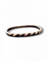 Full view of oval sterling bangle showing diagonal enamel pattern