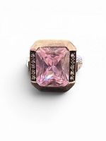 Top view of ring showing radiant-cut pink center stone and pave CZ sides