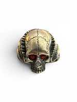 Front view of sterling silver skull ring with ruby eyes