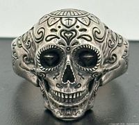 front view of sugar skull ring showing facial detailing