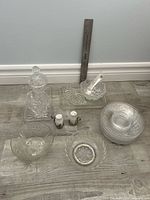 Overview of all glass pieces on floor