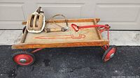 Side view of Werlich wagon with pulley and handle resting on deck