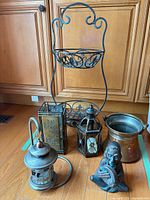 Group shot showing all six metal decor items