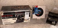 Group view of boxed Craftsman sander, Mastercraft disk pack, black accessory box