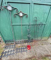 Full lot showing stakes, trellis, six fence panels and pail of lights