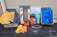 Overall lot with totes, blankets, straps, tarps, gloves, cords, floor protectors