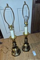 Full view of both brass lamp bases with harps and cords