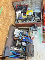 Top view of both open toolboxes showing majority of contents