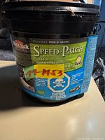 Actual bucket showing product label and new condition