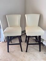 Both counter stools side by side showing design and leg finish