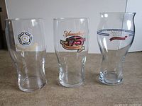 Group shot of the three logo beer glasses