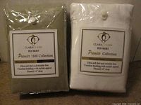 Front of both packaged bed skirts showing brand, collection and colors
