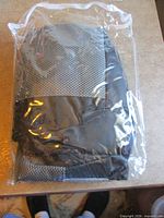 Factory-sealed seat cover package front view