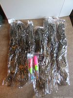 Seven sealed packs braided extensions and two latch hook tools overview